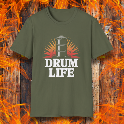 Green t-shirt with 'DRUM LIFE' design on a wooden background with flames.