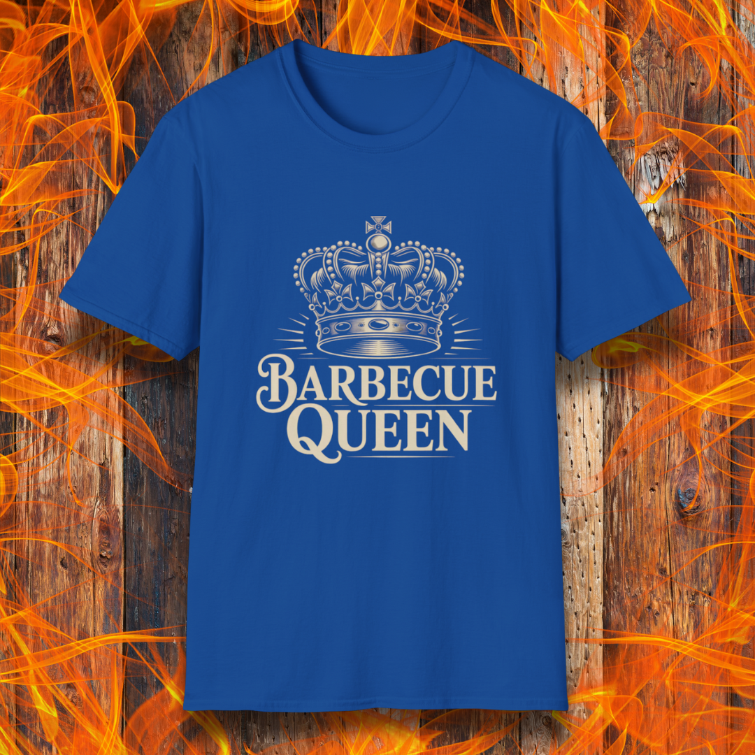 Blue t-shirt with 'Barbecue Queen' design on a wooden background with flames.