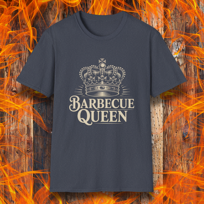 Navy blue t-shirt with 'Barbecue Queen' design on a wooden background with flames.