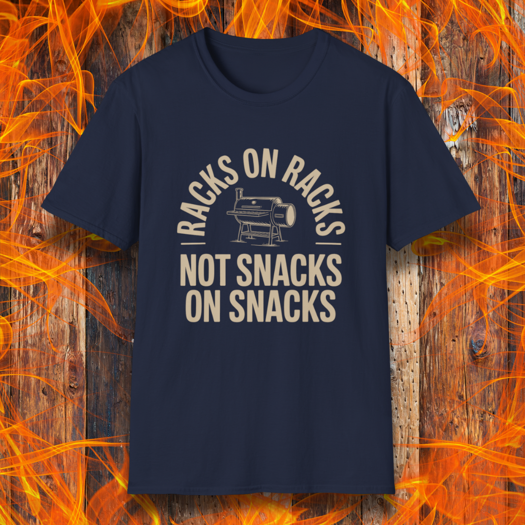 Navy blue t-shirt with graphic and text on a wooden background with flames