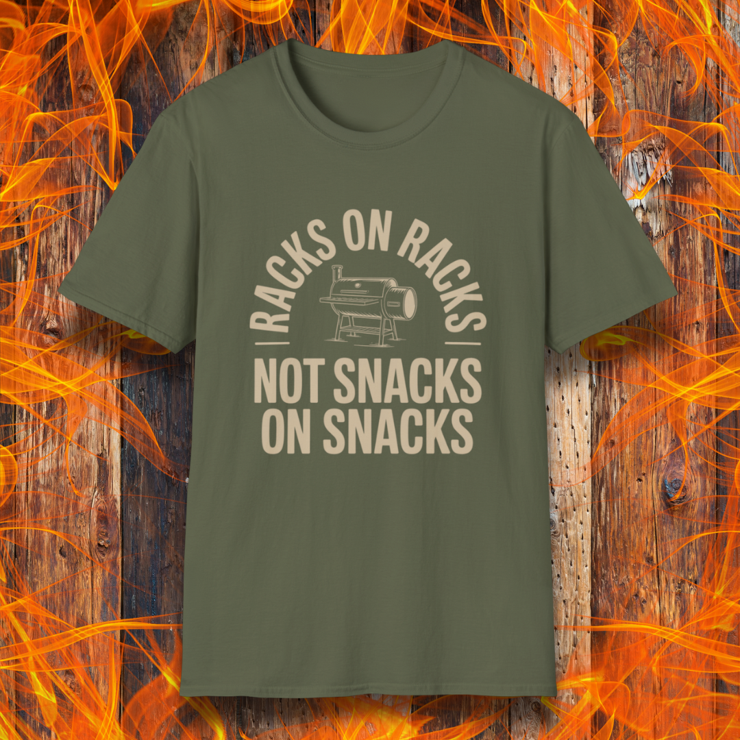 Green t-shirt with text design on a wooden background with flames