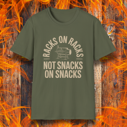 Green t-shirt with text design on a wooden background with flames