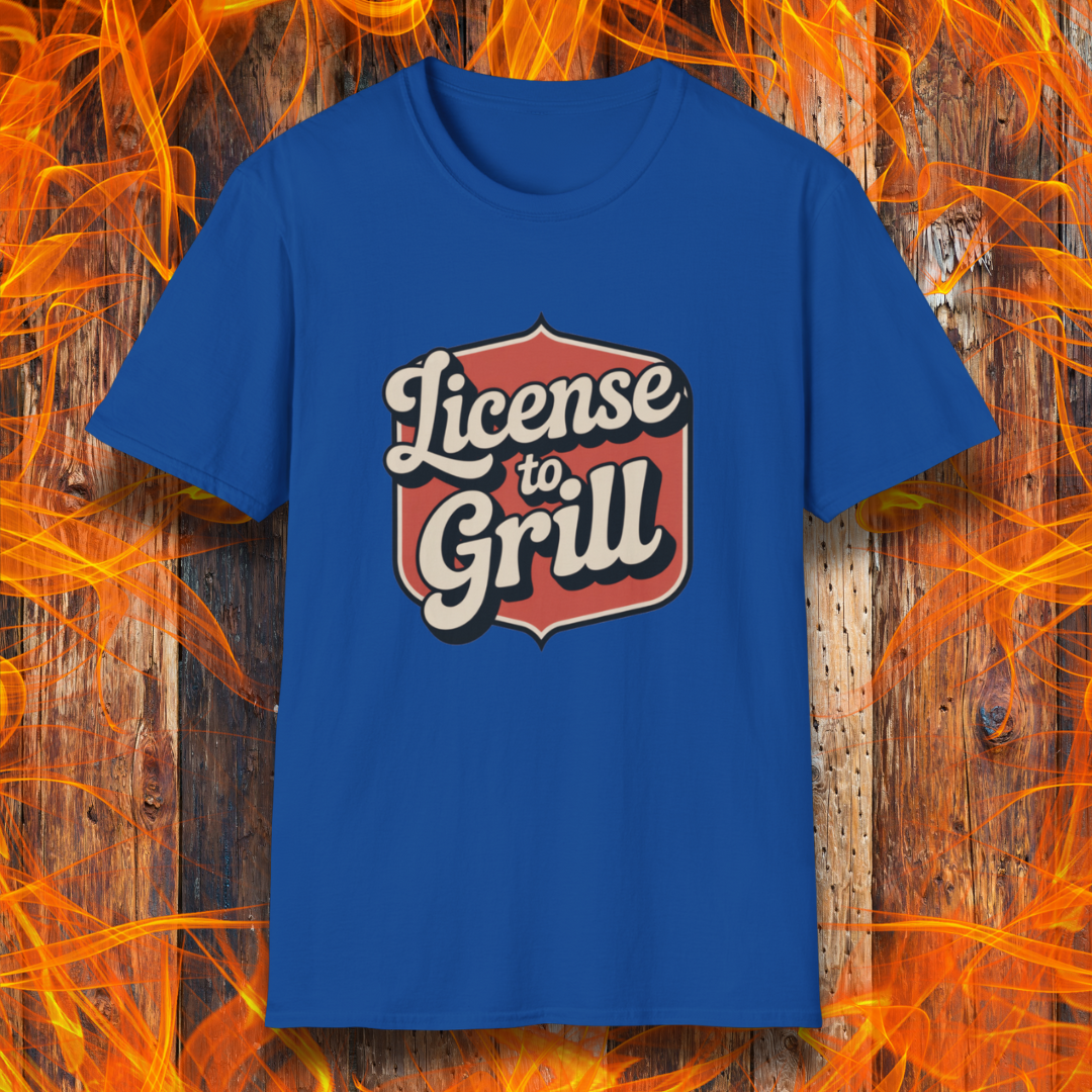 Blue t-shirt with 'License to Grill' design on a fiery background