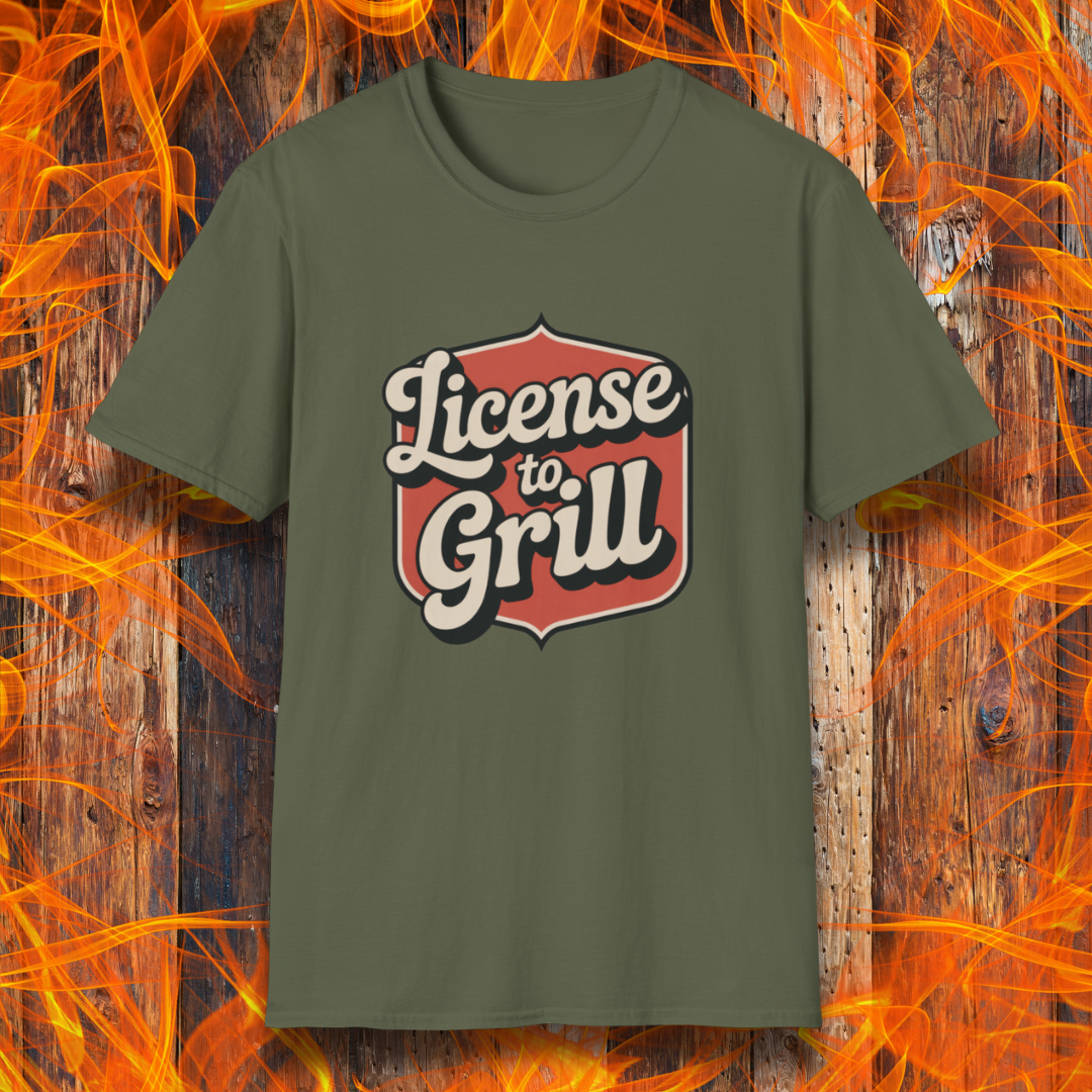 Green t-shirt with 'License to Grill' design on a fiery background