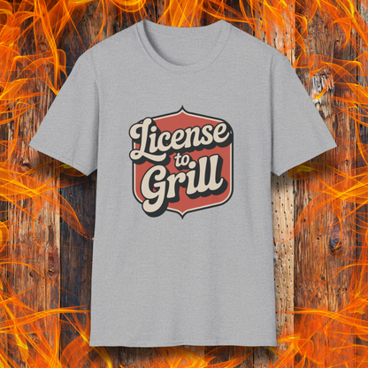 Grey t-shirt with 'License to Grill' design on a fiery background