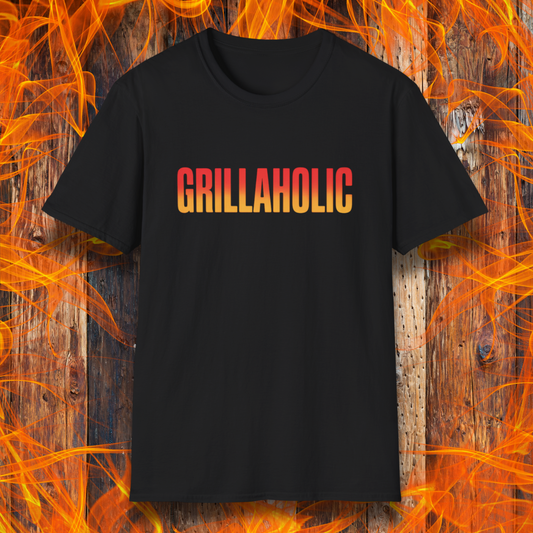Black t-shirt with 'GRILLAHOLIC' text on a wooden background with flames.