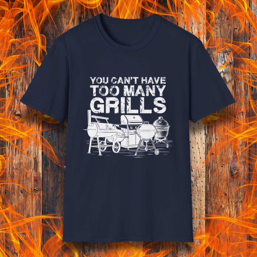 Navy blue t-shirt with 'You can't have too many grills' graphic on a wooden background with flames.