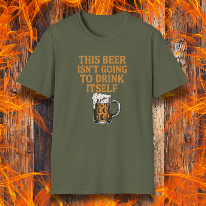 Green t-shirt with a beer graphic and text on a wooden background with flames.