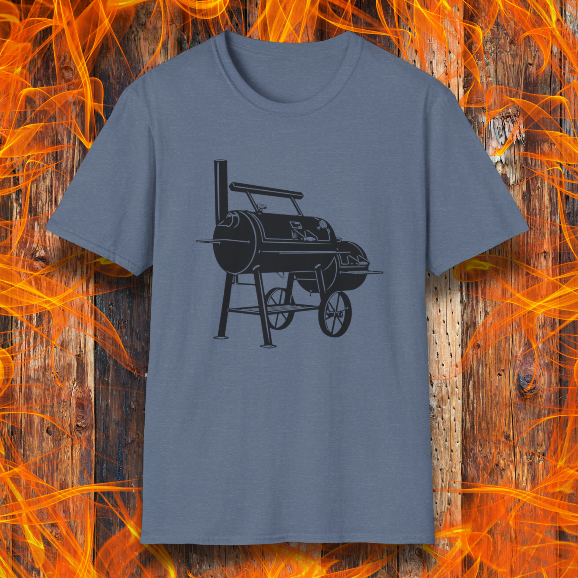 Blue t-shirt with a barbecue graphic on a wooden background with flames