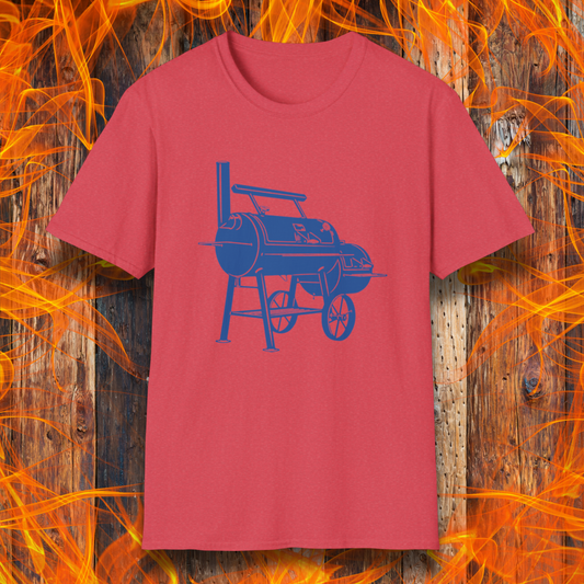 Red t-shirt with blue barbecue graphic on a wooden background with flames