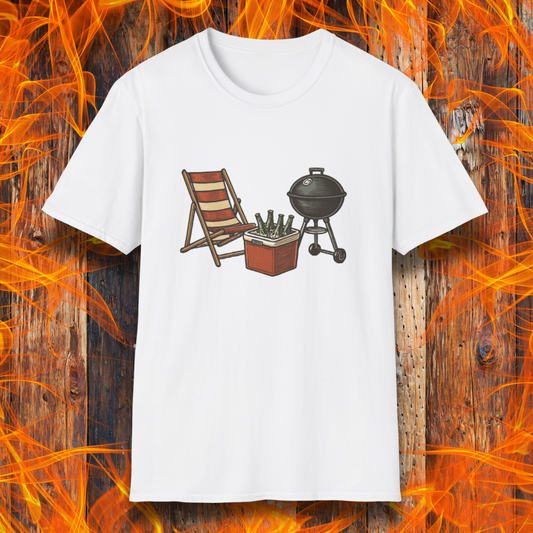 White t-shirt with a graphic of a grill, chair, and cooler on a wooden background with flames.