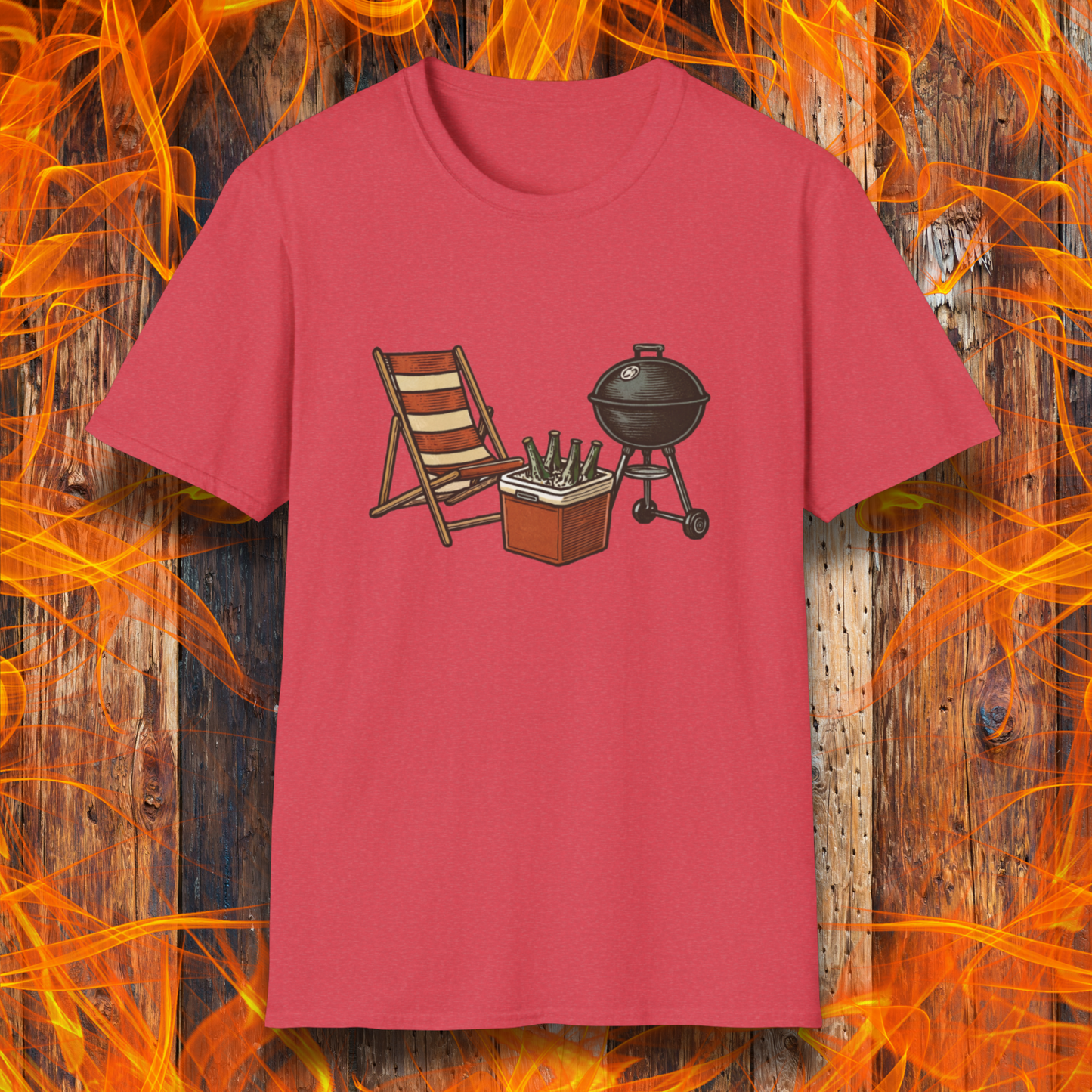 Red t-shirt with a graphic of a grill, chair, and cooler on a wooden background with flames.