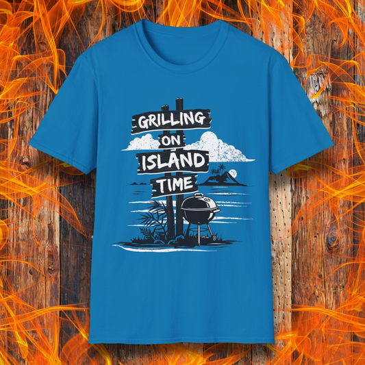 Blue t-shirt with 'Grilling on Island Time' design on a wooden background with flames.