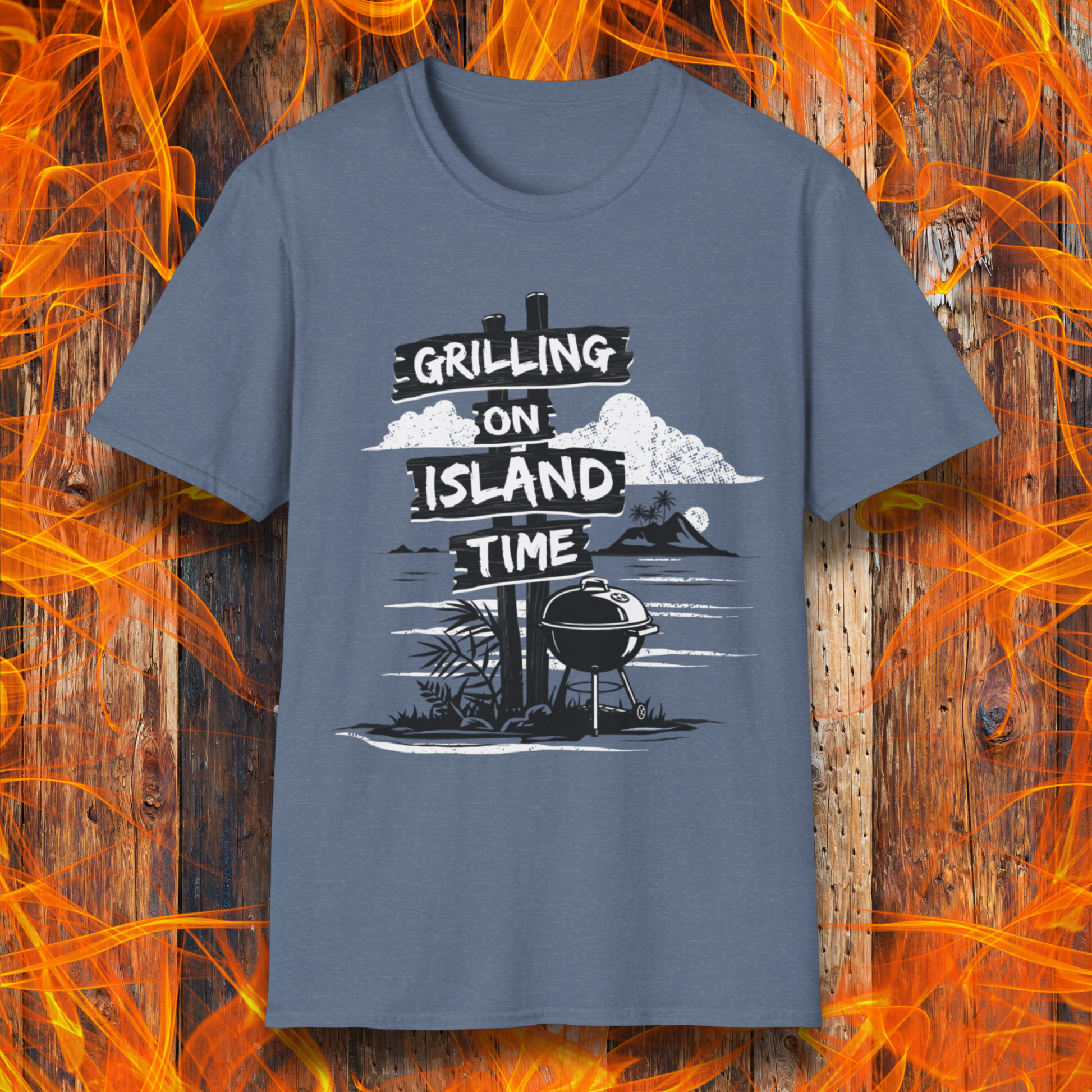 Blue t-shirt with 'Grilling on Island Time' graphic design on a wooden background with flames.