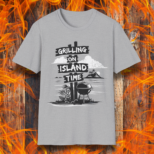 Gray t-shirt with 'Grilling on Island Time' graphic design on a wooden background with flames.