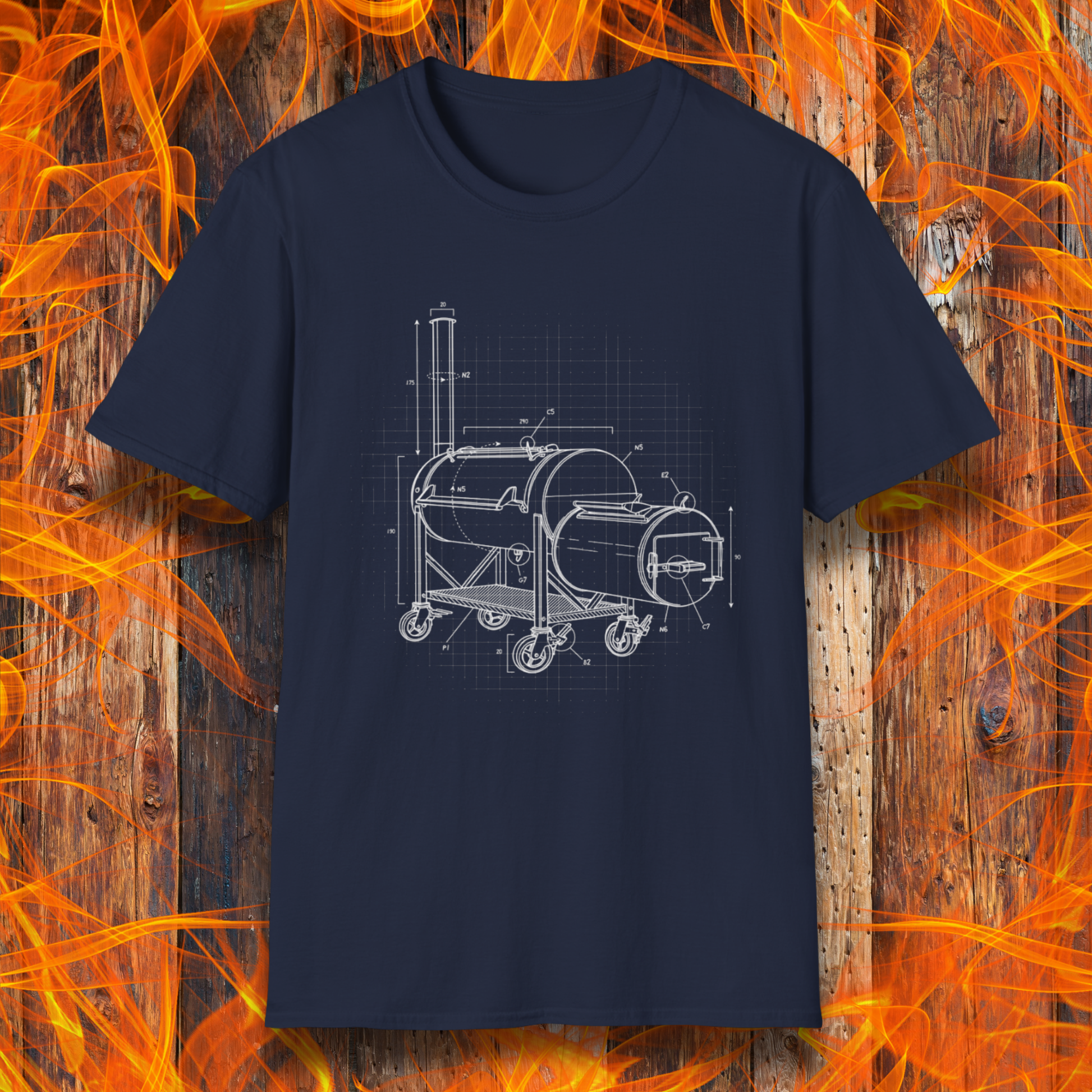Navy blue t-shirt with barbecue grill design on a wooden background with flames