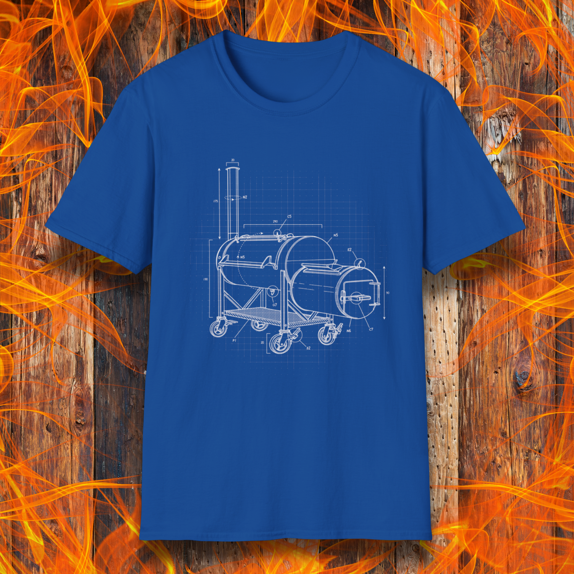 Blue t-shirt with barbecue grill design on a wooden background with flames