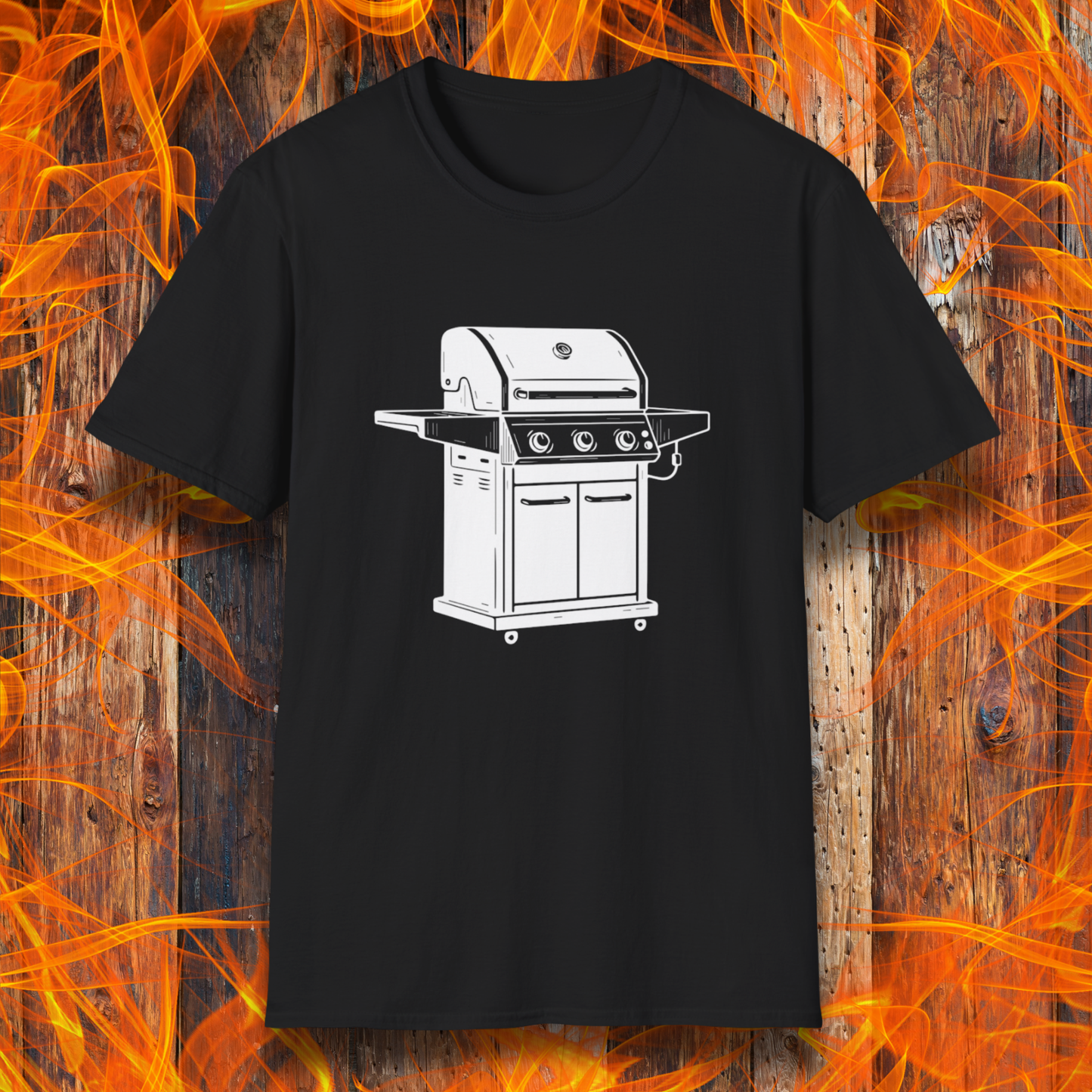 Black t-shirt with a white grill graphic on a wooden background with flames.