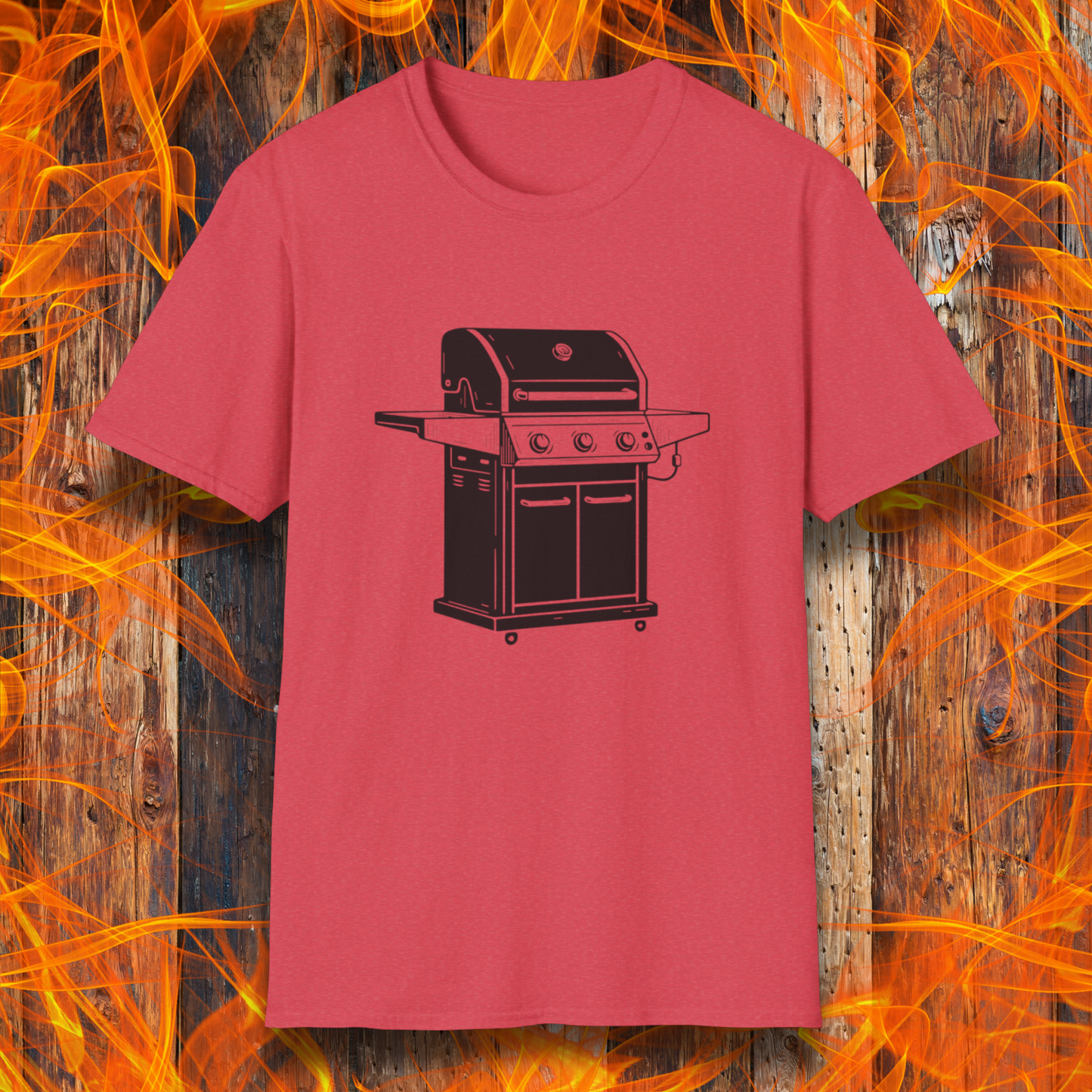 Red t-shirt with a black grill graphic on a wooden background with flames.