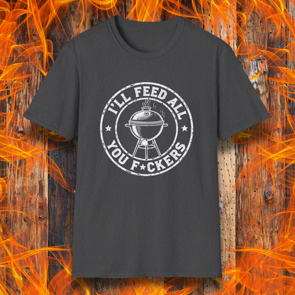 Black t-shirt with graphic design on a wooden background with flames