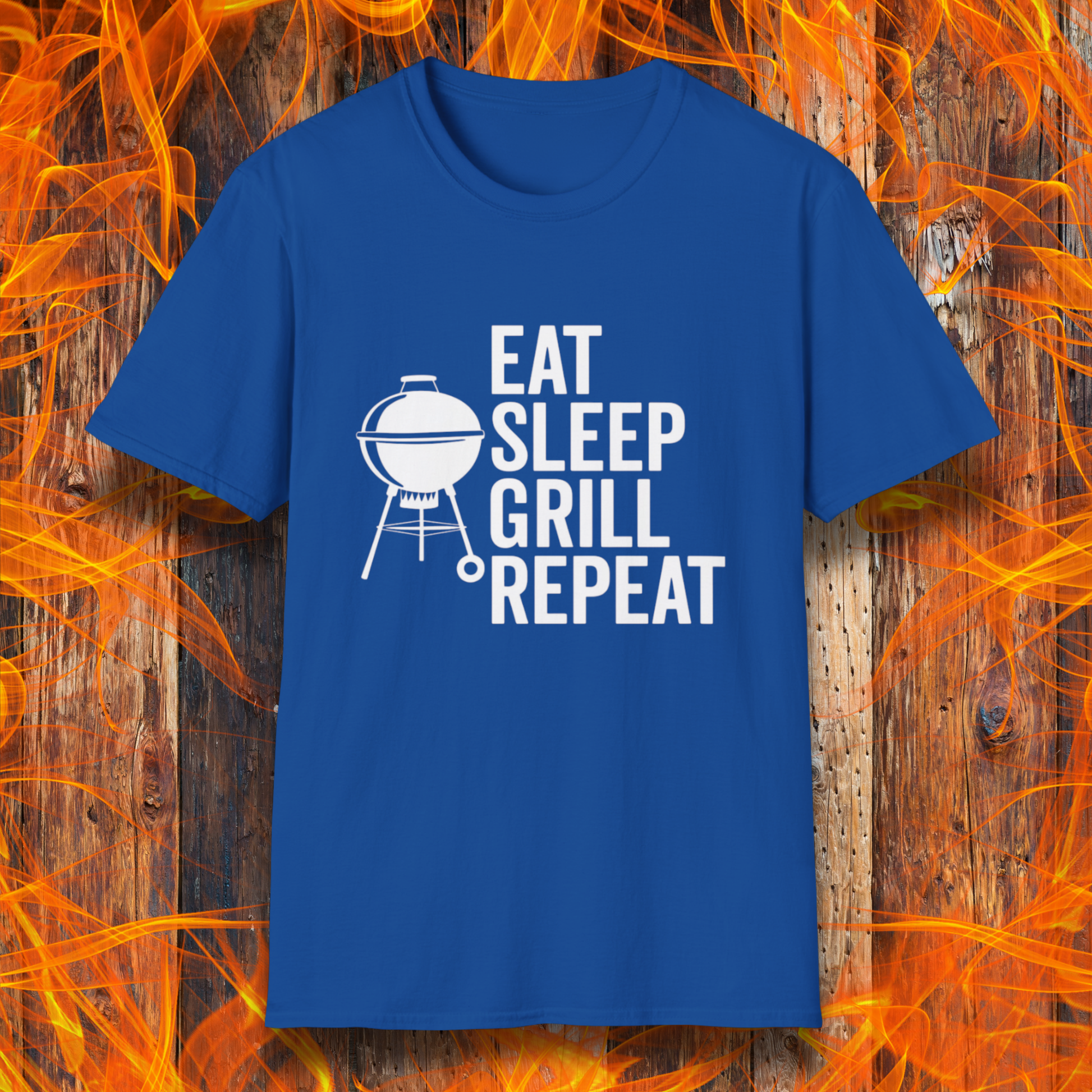 Blue t-shirt with 'Eat Sleep Grill Repeat' text and grill graphic on a fiery background