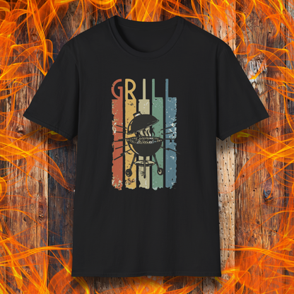 Black t-shirt with grill graphic on a wooden background with flames