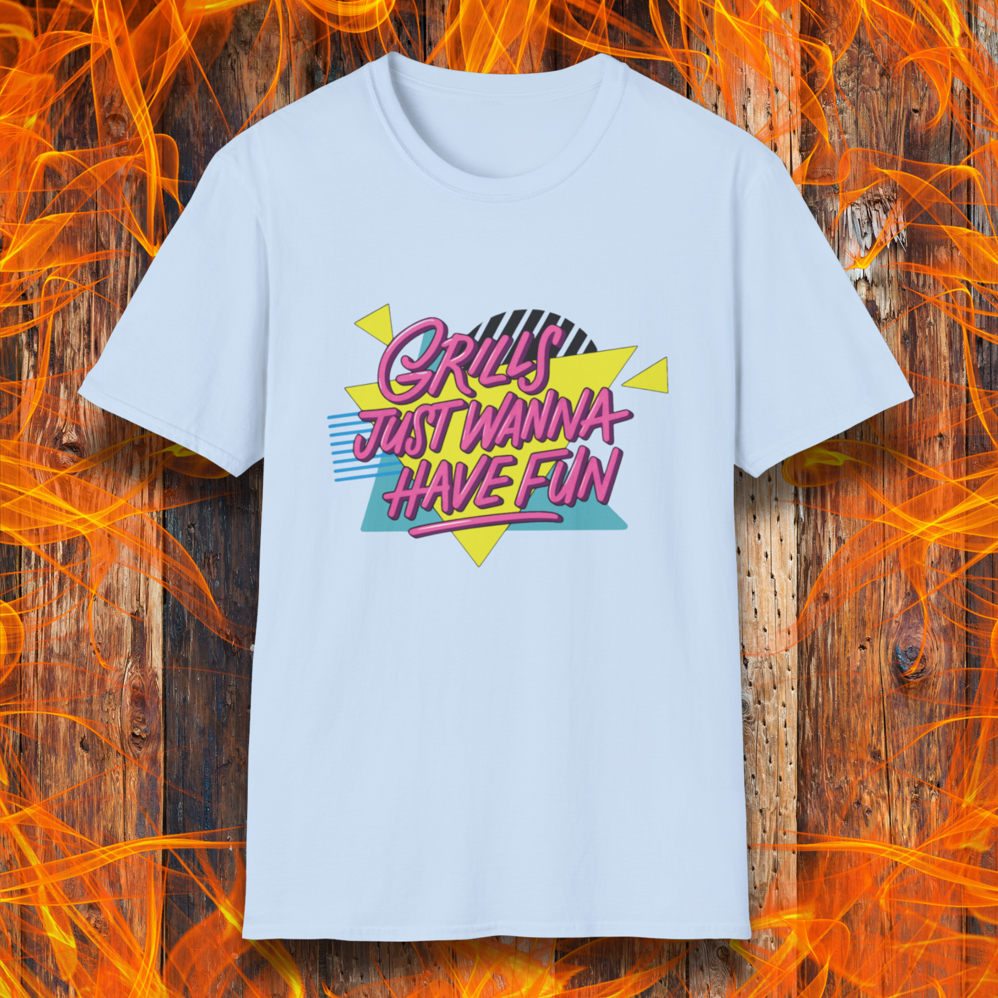 White t-shirt with colorful text design on a wooden background with flames