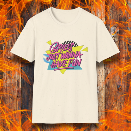 Beige t-shirt with colorful text design on a wooden background with flames