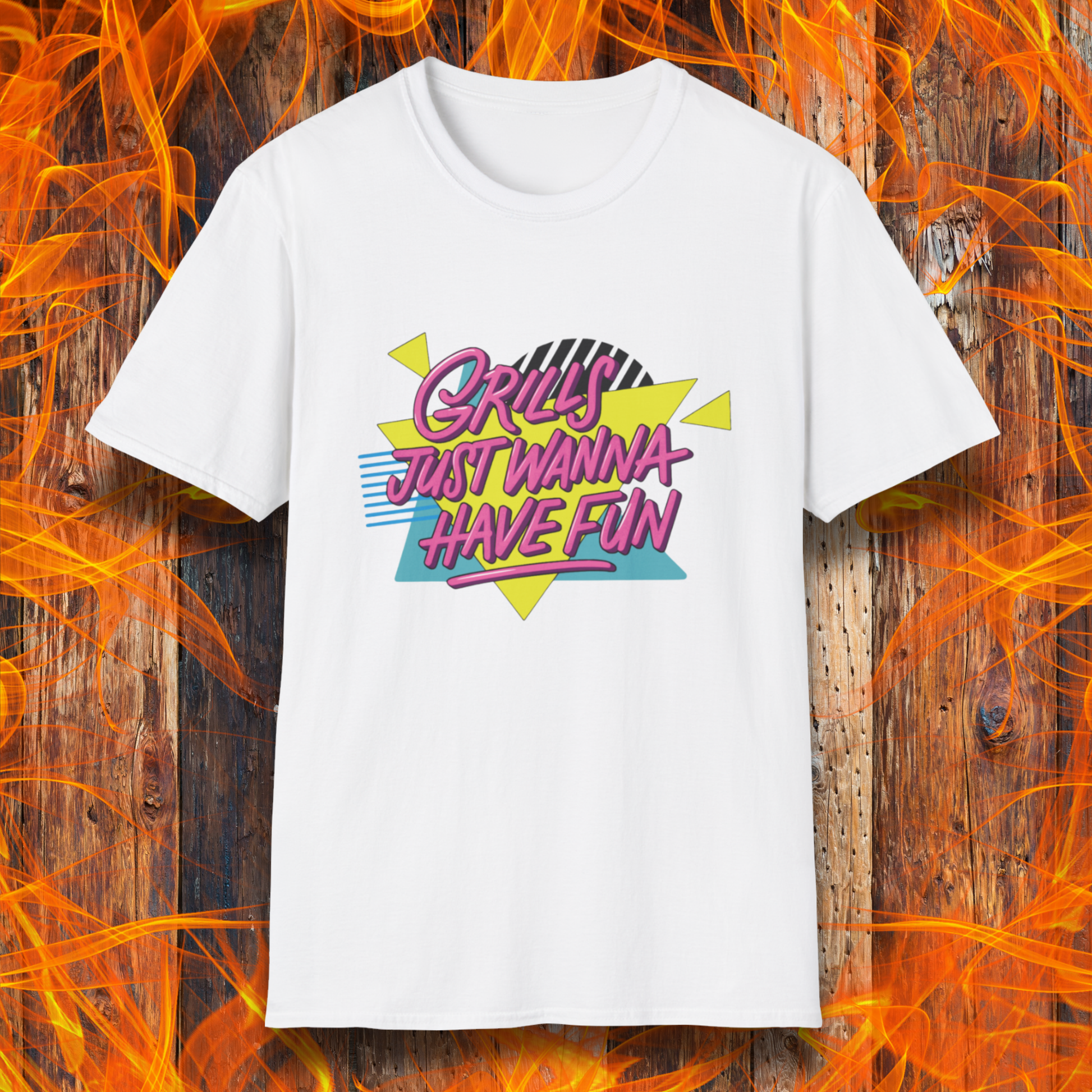 White t-shirt with colorful text design on a wooden background with flames
