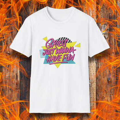 White t-shirt with colorful text design on a wooden background with flames