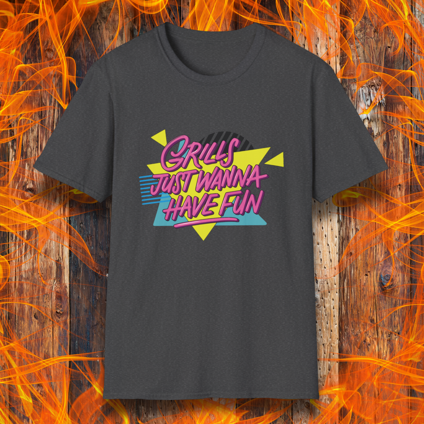 Black t-shirt with colorful text design on a wooden background with flames