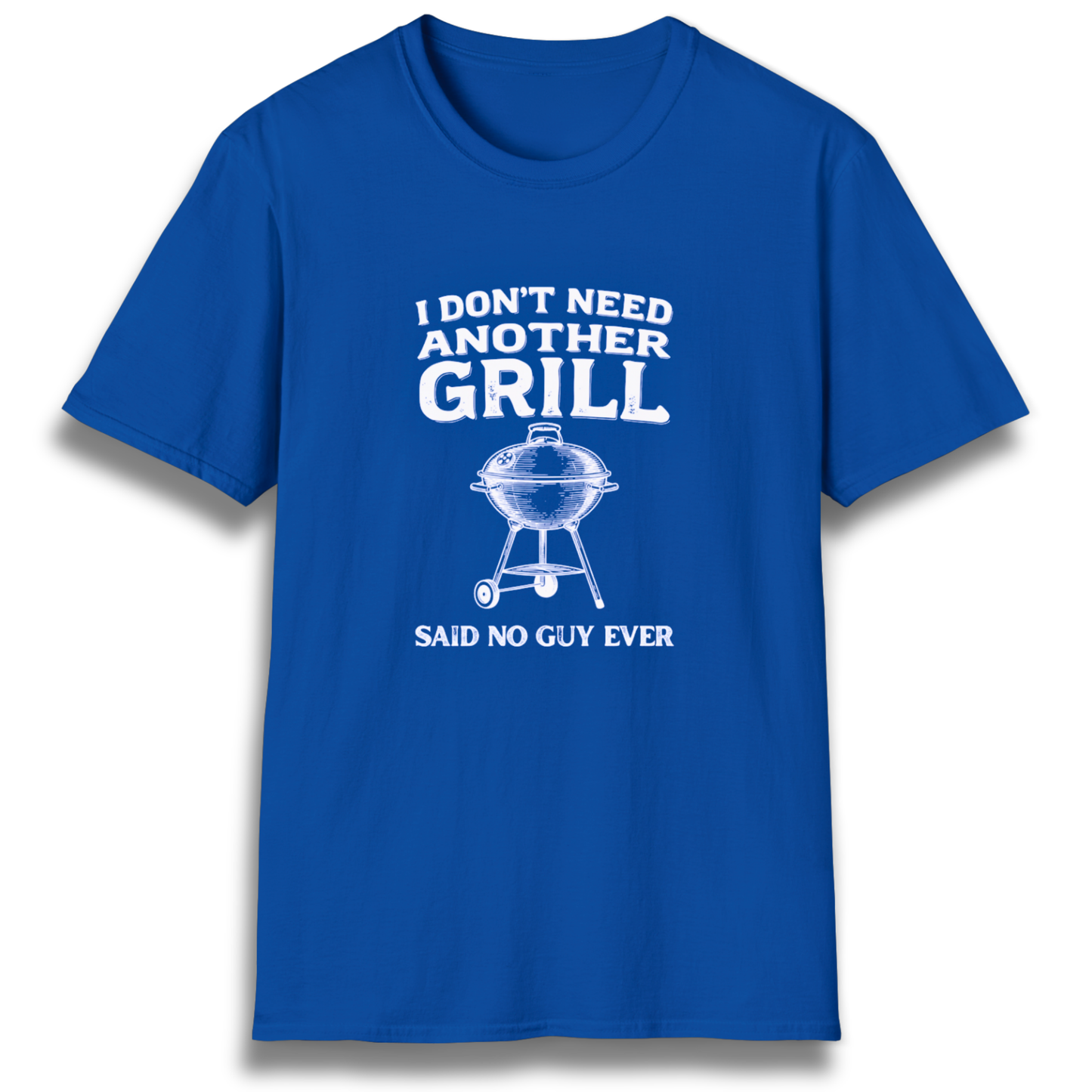 A T-shirt with the phrase "I don't need another grill, said no guy ever" with a graphic of a kettle charcoal grill.