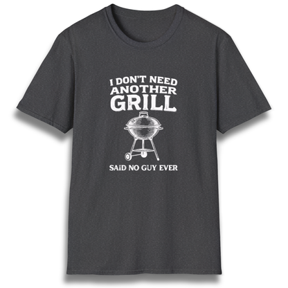A T-shirt with the phrase "I don't need another grill, said no guy ever" with a graphic of a kettle charcoal grill.