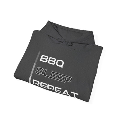 Folded hoodie with 'BBQ SLEEP REPEAT' text on a white background