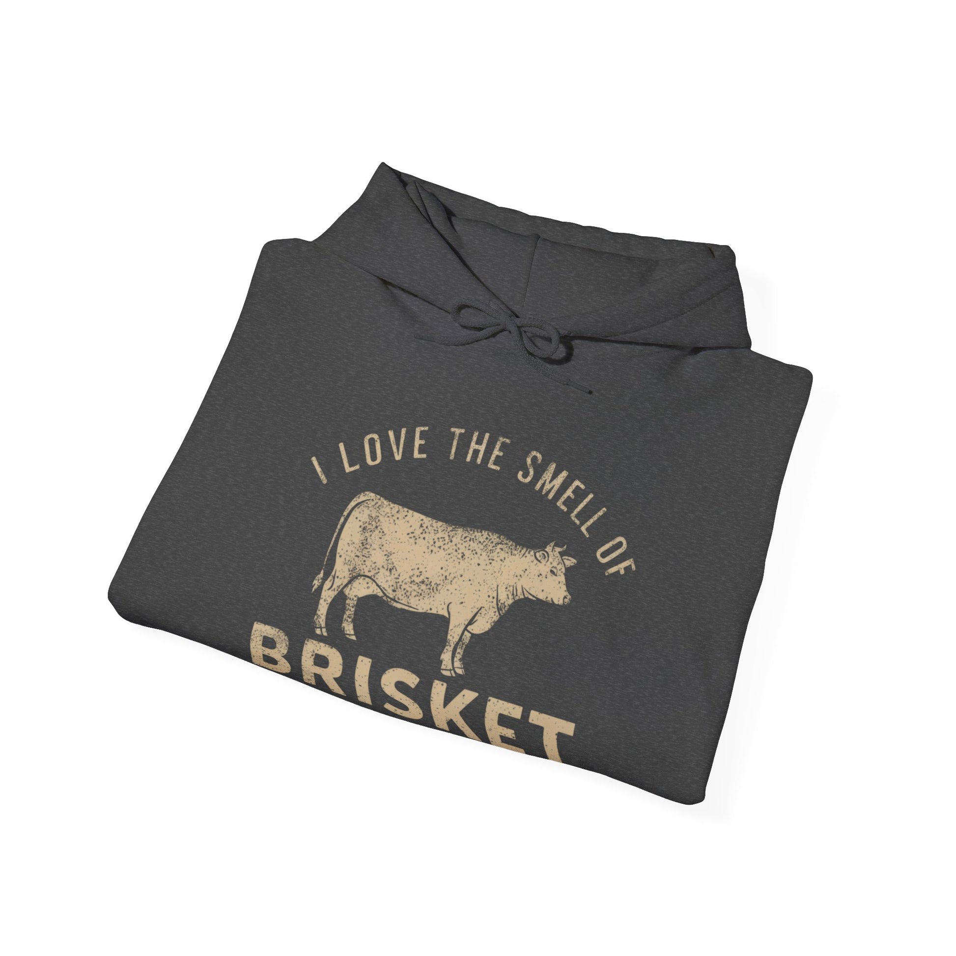 Folded dark gray hoodie with text "I love the smell of Brisket in the morning" and cow graphic on a white background
