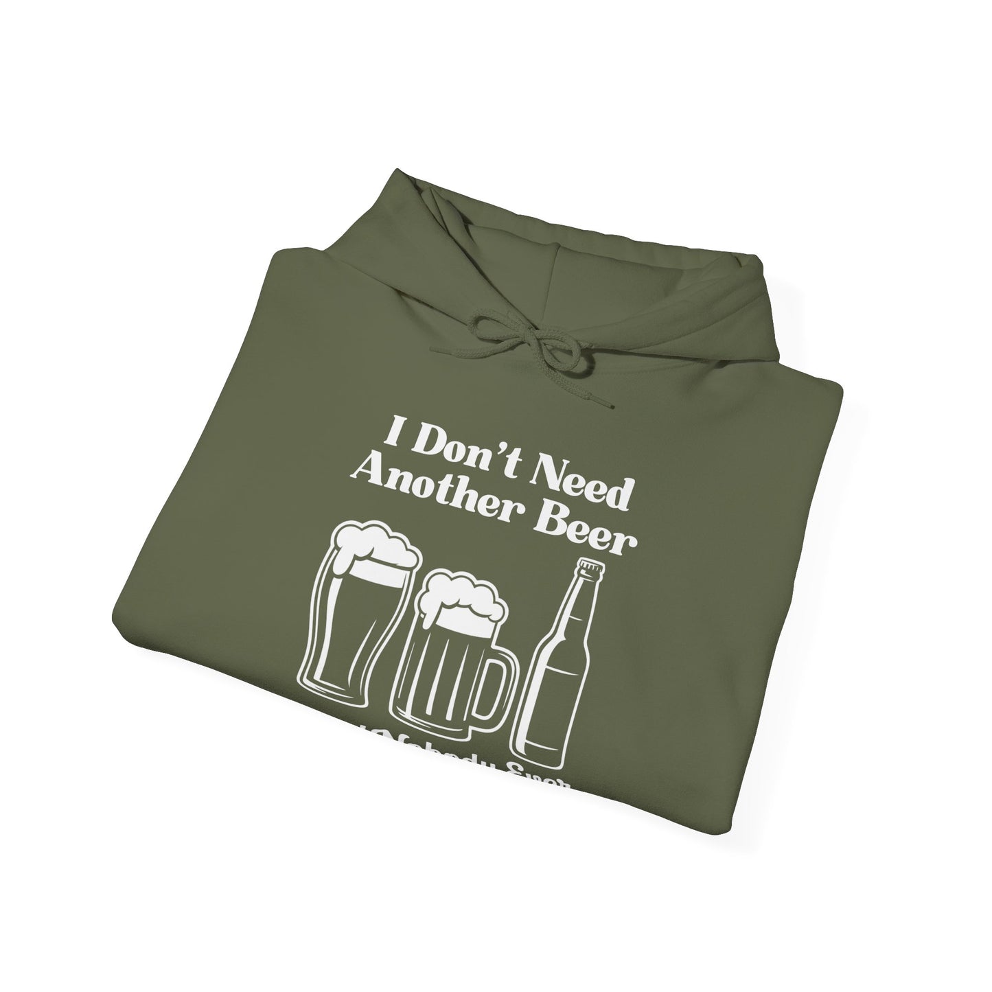 Folded olive green hoodie with white text "I don't need another beer said nobody ever" and graphics on a white background
