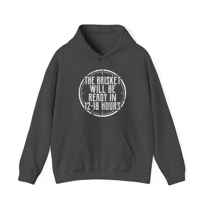 Dark gray hoodie with white text "The Brisket will be ready in 12-18 Hours" and a a click graphic on a white background