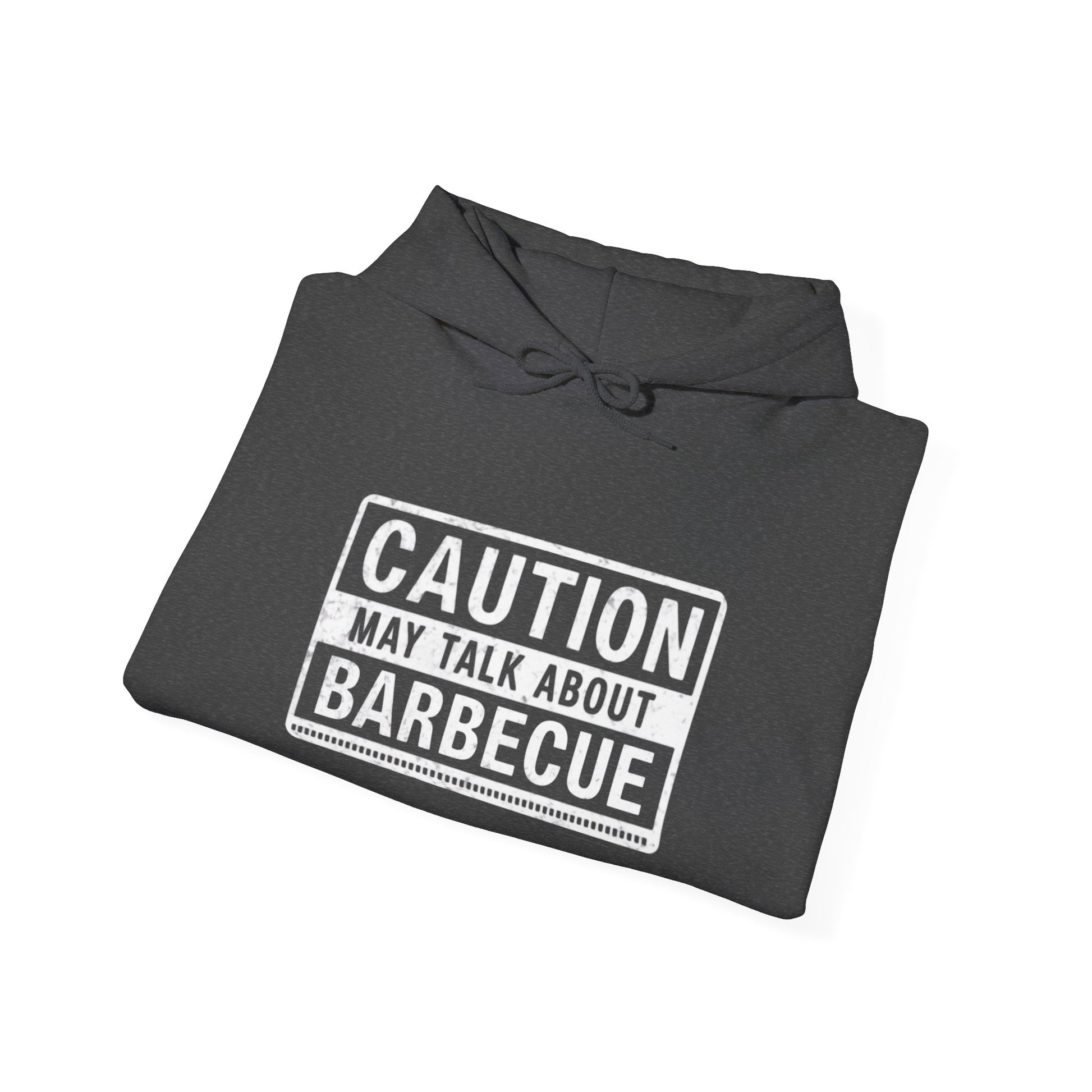 Folded gray hoodie with 'Caution: May Talk About Barbecue' text on a white background
