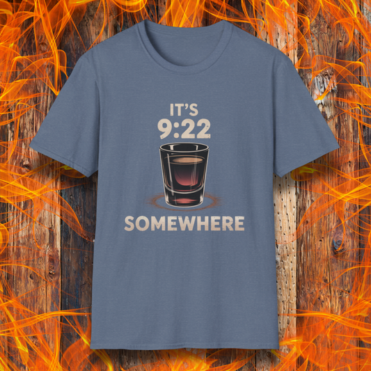 Heather Indigo T-shirt featuring the phrase "It’s 9:22 Somewhere" with a detailed shot glass illustration, set against a rustic wood and flame background — a nod to the BBQ competition tradition of the 9:22 shot.