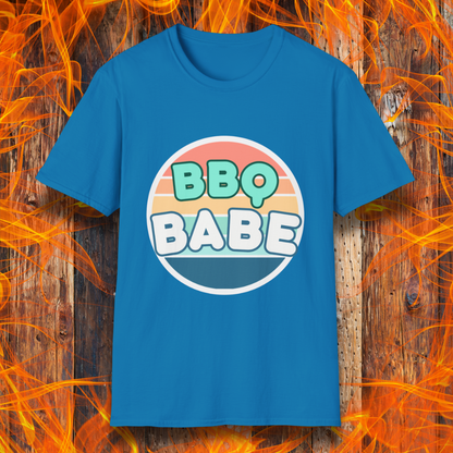 Sapphire Blue T-shirt with a retro-style 'BBQ Babe' design featuring bold, pastel lettering inside a vintage sunset circle. A fun and stylish choice for BBQ enthusiasts who love to grill in style.