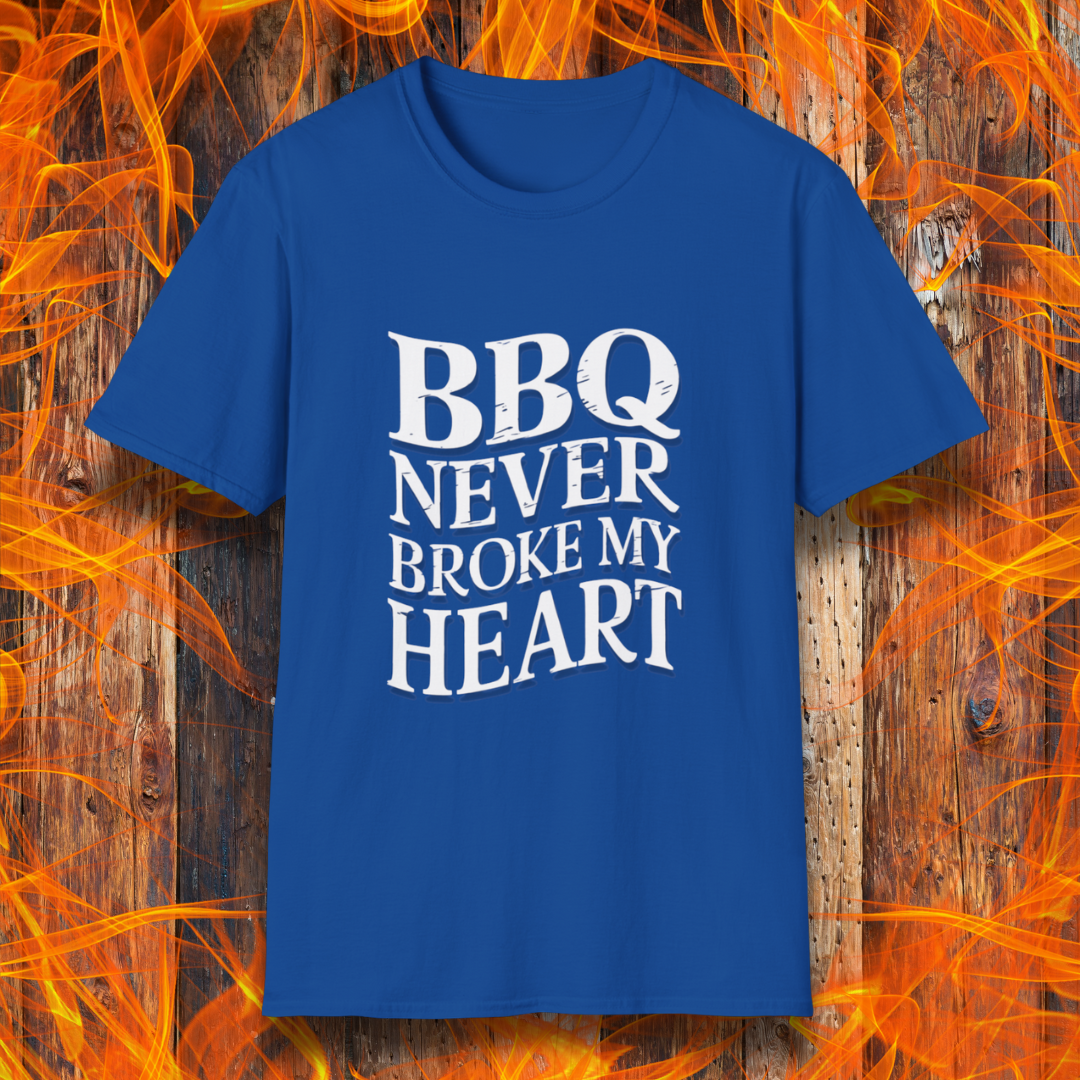 Royal Blue  t-shirt featuring bold white text that reads 'BBQ Never Broke My Heart' in a rustic, slightly distressed font, perfect for barbecue lovers who stay loyal to great smoked meats.