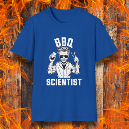 Royal Blue t-shirt featuring a bold black-and-white illustration of a cool scientist holding BBQ tongs and a beaker, with the phrase 'BBQ Scientist' displayed above and below."