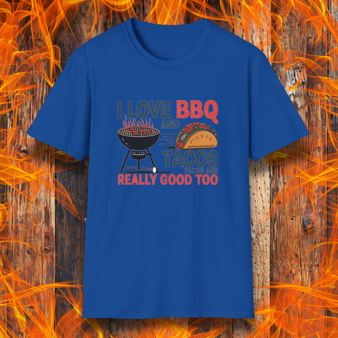 Royal Blue T-shirt features a fun and bold design that reads, "I Love BBQ and Tacos... Tacos Are Really Good Too," with graphics of a flaming grill and a delicious taco. Perfect for BBQ lovers who also enjoy a good taco, this shirt combines humor and food passion in a stylish way.