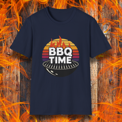 Navy T-shirt featuring a bold "BBQ TIME" design with a retro sunset background, flames, and a charcoal grill illustration. Perfect for barbecue lovers and grill masters.