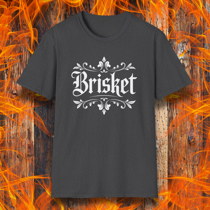 Dark Heather t-shirt with elegant white gothic-style “Brisket” text framed by ornate flourishes—where BBQ obsession meets old-school swagger.