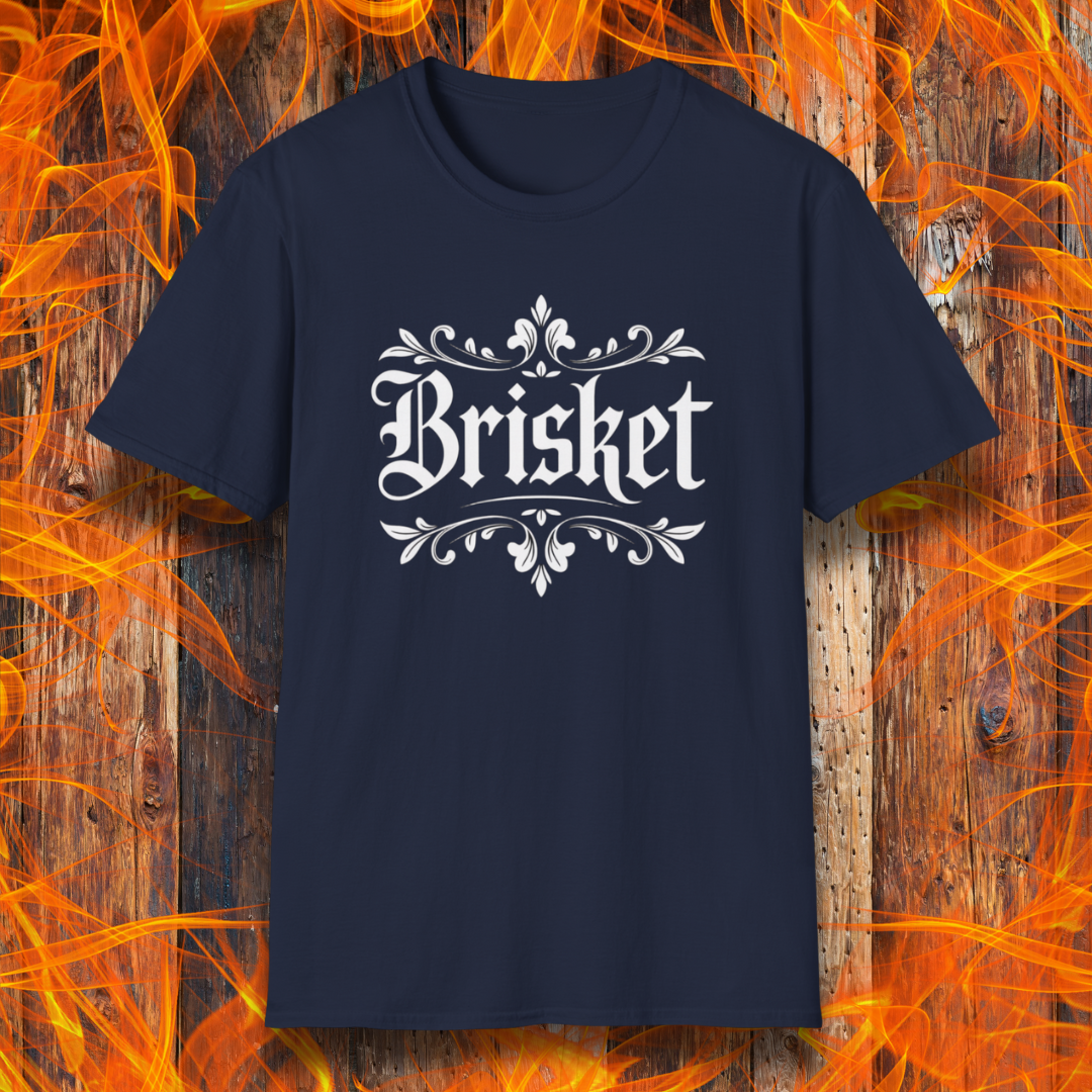 Navy t-shirt with elegant white gothic-style “Brisket” text framed by ornate flourishes—where BBQ obsession meets old-school swagger.
