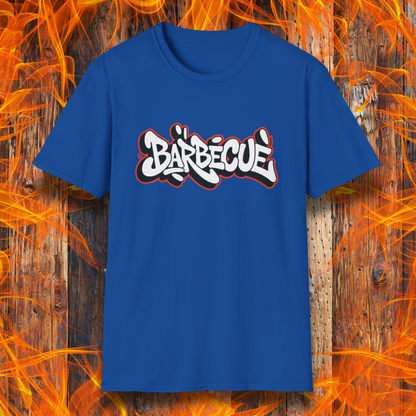 Blue t-shirt with 'Barbécè' text on a wooden background with flames.