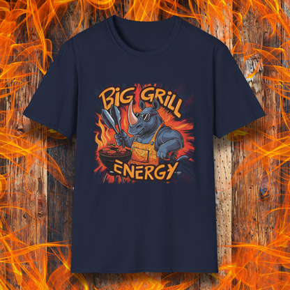 Navy t-shirt featuring a bold and vibrant design of a muscular rhino wearing sunglasses and an apron, grilling meat with tongs in hand. The fiery background highlights the phrase 'Big Grill Energy' in dynamic, flame-inspired lettering