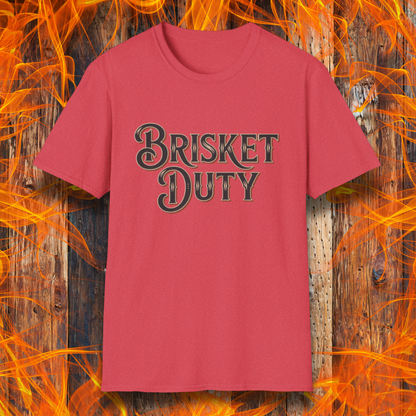 Heather Red t-shirt with bold Western-style "Brisket Duty" text—ideal for pitmasters, BBQ crew members, or anyone proudly on call for the smoker.