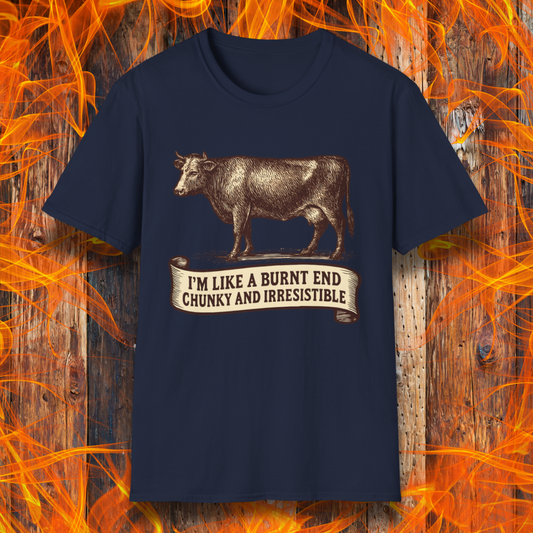 Navy blue t-shirt with a cow graphic and text on a wooden background with flames.
